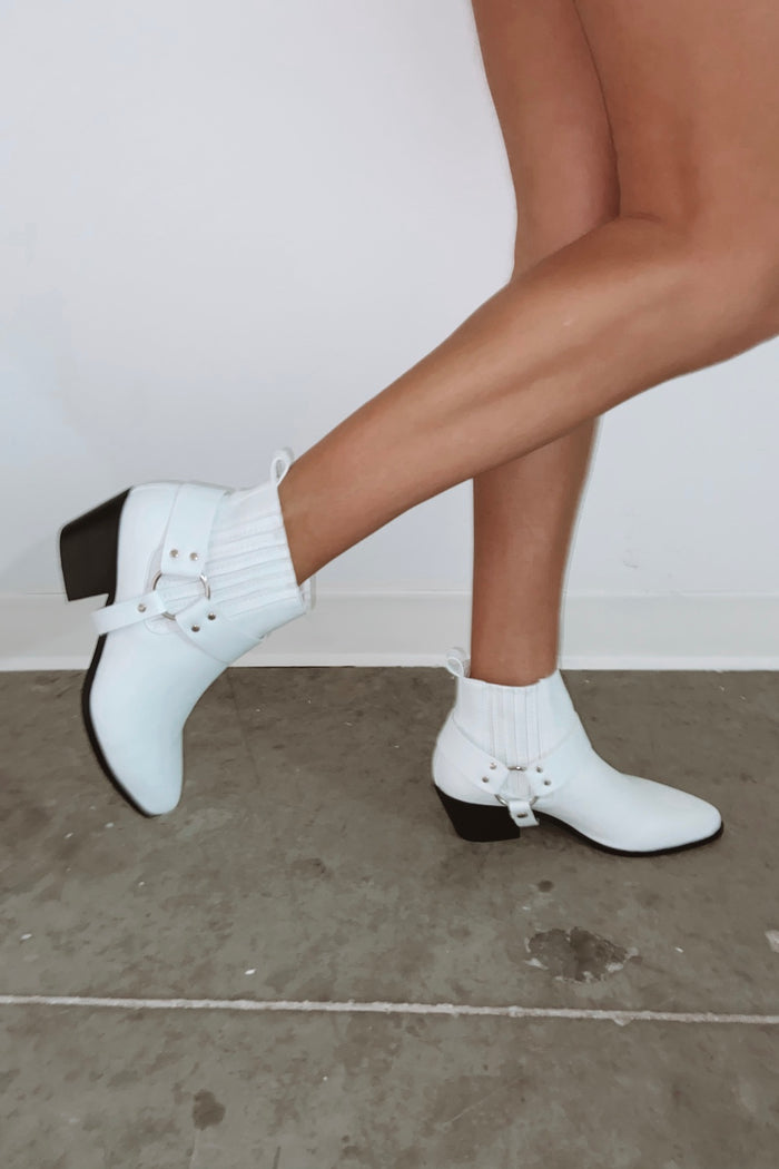 Shop white booties.