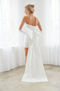 white-image | white bodycon dress with floor length bow - courthouse outfit inspo - white bodycon dress for engagment photos - strapless dress for brides - outfit inspo for wedding reception | white-image